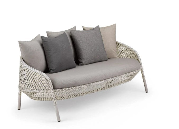 Luxury outdoor AHNDA sofa by Dedon, featuring hand-made weather-resistant materials, ergonomic comfort, and modernist design. by Dedon for sale at Home Resource Modern Furniture Store Sarasota Florida