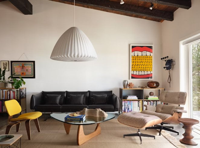 A modern and contemporary Noguchi Table by Herman Miller, featuring a sculptural wood base and freeform glass top, perfect for dining rooms or offices. Iconic design available at Home Resource of Sarasota Florida. by Herman Miller for sale at Home Resource Modern Furniture Store Sarasota Florida