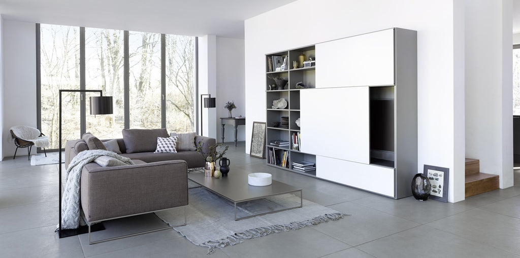 A sleek Interlübke Studimo House Bar featuring adjustable glass shelves, LED lighting, and sophisticated German design for a modern living room. Available in Sarasota, FL.
 by INTERLUBKE for sale at Home Resource Modern Furniture Store Sarasota Florida