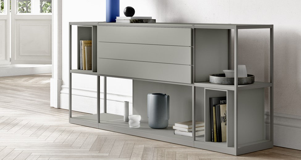 A customizable Interlübke Tado Shelf, featuring modular boxes and handcrafted German design, perfect for displaying personal treasures in a sophisticated living room.
 by INTERLUBKE for sale at Home Resource Modern Furniture Store Sarasota Florida