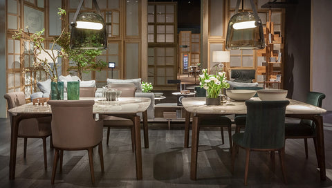 Poltrona Frau Diva dining room chair in fine leather with an elegant curved backrest, handcrafted with luxurious craftsmanship and sophisticated Italian design.
 by Poltrona Frau