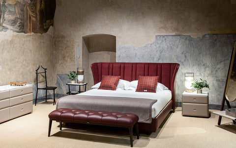 Glenn Bench by Poltrona Frau, featuring solid ash base, birch plywood frame with Wenge or Moka stain, four slender legs, Pelle Frau® leather upholstery, and elastic belt spring system. by Poltrona Frau