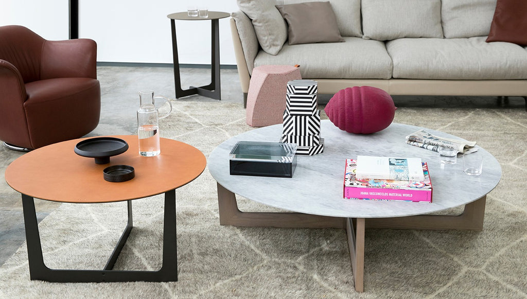 Ilary side piece collection by Poltrona Frau, featuring various heights and shapes with fine leather and Italian craftsmanship for a luxurious, modern living room. by Poltrona Frau for sale at Home Resource Modern Furniture Store Sarasota Florida