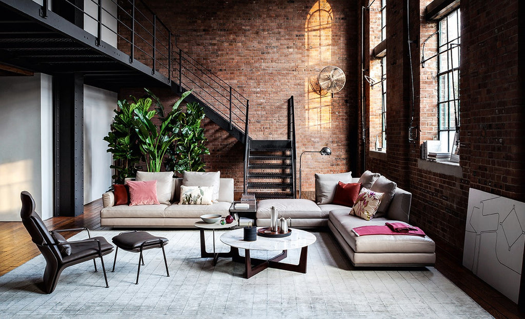 Ilary side piece collection by Poltrona Frau, featuring various heights and shapes with fine leather and Italian craftsmanship for a luxurious, modern living room. by Poltrona Frau for sale at Home Resource Modern Furniture Store Sarasota Florida