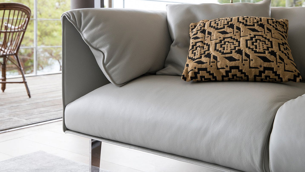 John John Sofa by Poltrona Frau, featuring fine leather upholstery, soft goose down cushions, and a solid beech frame, offering sophisticated luxury for the living room. by Poltrona Frau for sale at Home Resource Modern Furniture Store Sarasota Florida