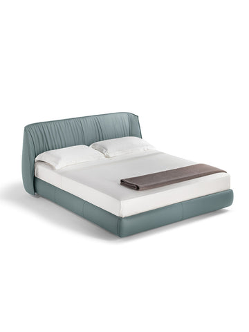 Poltrona Frau Archibald Bed upholstered in fine Pelle Frau® leather with customizable feet and backrest options. Luxurious Italian craftsmanship for a modern bedroom.
 by Poltrona Frau