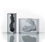 Angelo & Angela  by GLAS ITALIA, available at the Home Resource furniture store Sarasota Florida