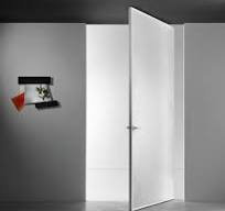 Aladin Pivot glass door by GLAS ITALIA