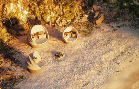 Dedon Orbit Collection, a luxury, hand-made, weather-resistant outdoor sofa with a round design and smooth-gliding casters for modern relaxation. by Dedon