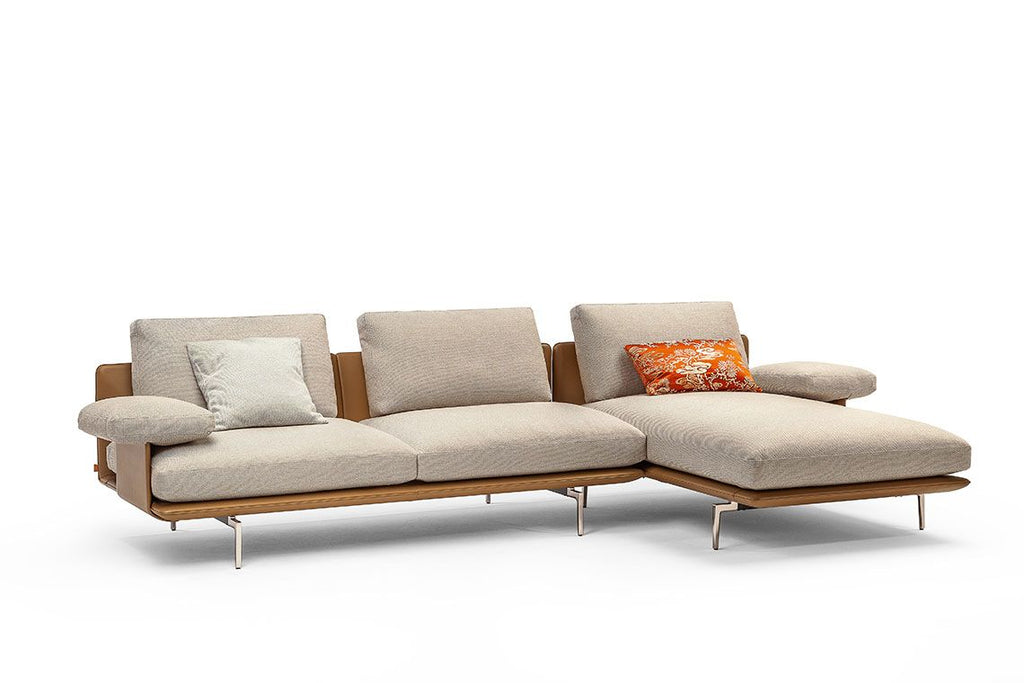 Get Back sofa by Poltrona Frau, featuring Pelle Frau® leather upholstery, sleek lines, comfortable design, and homage to the Beatles. Innovative materials, unique design. by Poltrona Frau for sale at Home Resource Modern Furniture Store Sarasota Florida