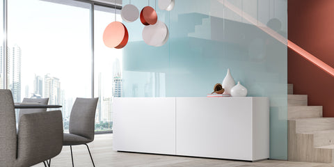 Interlübke’s Jorel sideboard in asymmetrical design, featuring vertical handle grooves and handcrafted German design. Available at Home Resource of Sarasota Florida.
 by INTERLUBKE