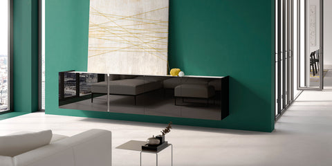 Interlübke Jorel wall-mounted sideboard in asymmetrical design, handcrafted with vertical handle grooves. Available at Home Resource of Sarasota Florida.
 by INTERLUBKE