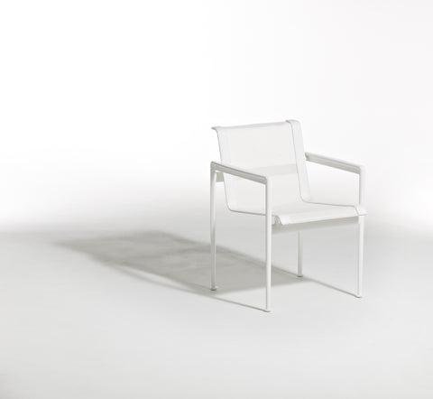 Knoll 1966 Collection Arm Dining Chair featuring iconic modern design, weather-resilient materials, and quality craftsmanship for outdoor dining. by Knoll