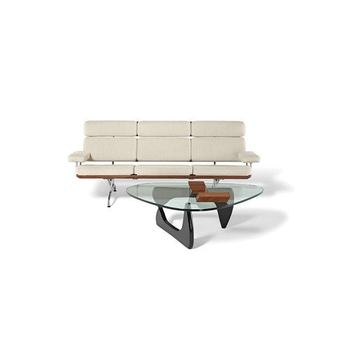 A modern and contemporary Noguchi Table by Herman Miller, featuring a sculptural wood base and freeform glass top, perfect for dining rooms or offices. Iconic design available at Home Resource of Sarasota Florida. by Herman Miller for sale at Home Resource Modern Furniture Store Sarasota Florida