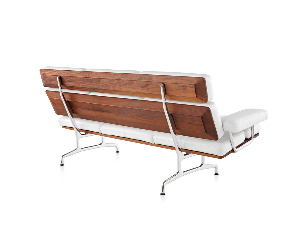 Eames Sofa by Herman Miller, modern and ergonomic, crafted with walnut, leather, and polished aluminum. Available at Home Resource Sarasota. by Herman Miller for sale at Home Resource Modern Furniture Store Sarasota Florida