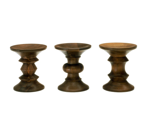 Eames Turned Stools by Herman Miller, modern walnut stools with iconic design, perfect for living rooms or offices, available at Home Resource Sarasota.