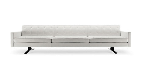 The Kennedee sofa by Poltrona Frau features elegant modular design with fine leather upholstery, modern quilting, and craftsmanship. Perfect for a sophisticated living room. by Poltrona Frau