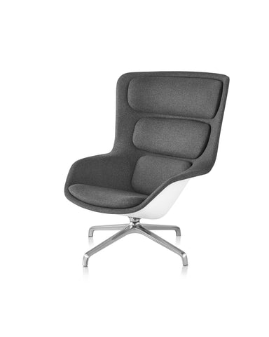 Striad Lounge Chair and Ottoman by Herman Miller Furniture featuring a layered ergonomic design, modern style, and customizable options for office or living spaces.