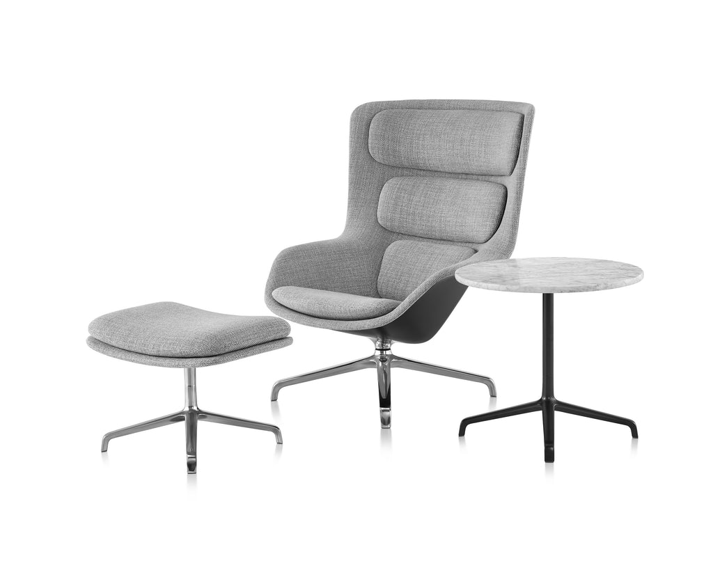 Striad Lounge Chair and Ottoman by Herman Miller Furniture featuring a layered ergonomic design, modern style, and customizable options for office or living spaces. by Herman Miller for sale at Home Resource Modern Furniture Store Sarasota Florida
