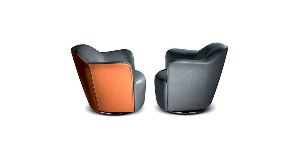 Poltrona Frau Aida Swivel Chair in fine leather, showcasing a luxurious, handmade design with curved armrests, perfect for a sophisticated living room setting.
  by Poltrona Frau, available at the Home Resource furniture store Sarasota Florida