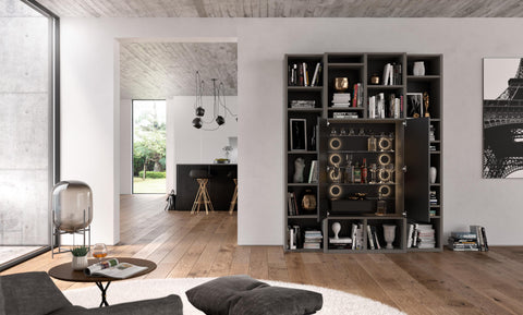 A sleek Interlübke Studimo House Bar featuring adjustable glass shelves, LED lighting, and sophisticated German design for a modern living room. Available in Sarasota, FL.
 by INTERLUBKE