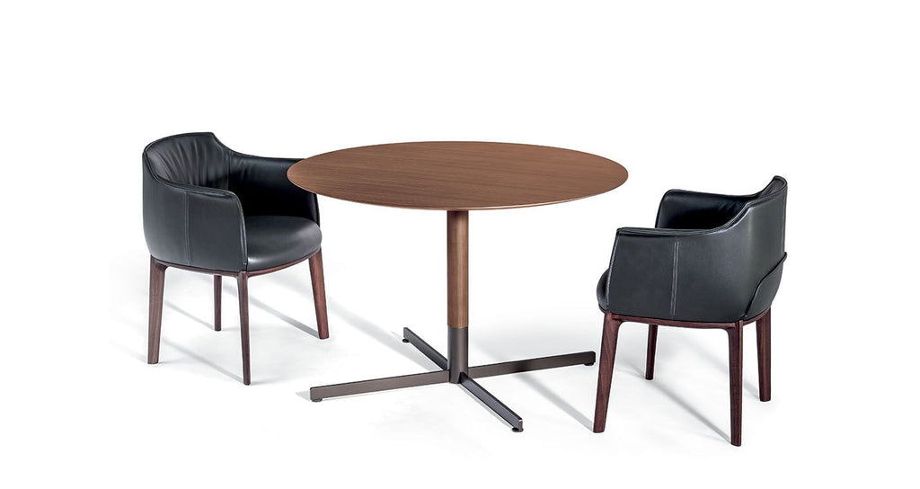 Bob Bistrot dining table by Poltrona Frau, showcasing Italian craftsmanship and luxurious design, made with fine materials. Available at Home Resource of Sarasota, Florida.
  by Poltrona Frau, available at the Home Resource furniture store Sarasota Florida