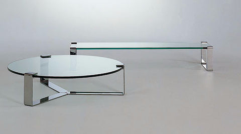 A set of modern design German tables by Draenert, featuring glass tops and steel skids, available in polished chrome, matt chrome, or matt nickel finishes. by DRAENERT
