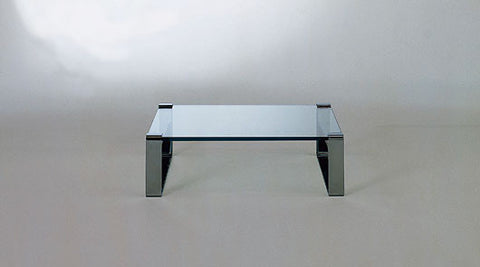 A set of modern design German tables by Draenert, featuring glass tops and steel skids, available in polished chrome, matt chrome, or matt nickel finishes. by DRAENERT