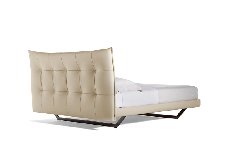 Aurora Tre Bed by Poltrona Frau, upholstered in fine Pelle Frau® leather with a padded, quilted headboard. Luxurious craftsmanship and modern Italian design.
 by Poltrona Frau for sale at Home Resource Modern Furniture Store Sarasota Florida