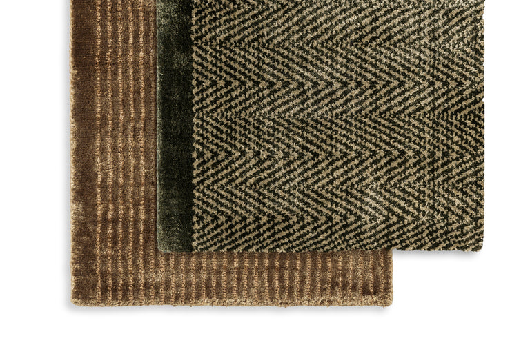 Harp & Harp Vibration Rugs by Poltrona Frau, featuring 100% natural silk, hand-knotted with 86 thousand knots per square meter, striped and chevron patterns, soft velvet feel, and luxurious materials.  by Poltrona Frau, available at the Home Resource furniture store Sarasota Florida