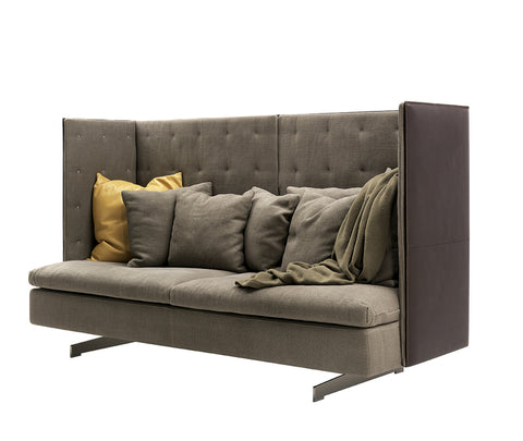GranTorino HB sofa by Poltrona Frau, featuring compact volume, titanium-colored aluminum feet, birch plywood panels, goose down cushions, and luxurious Pelle Frau® leather upholstery. by Poltrona Frau