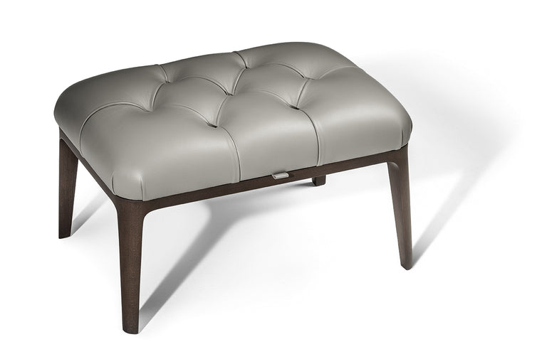 Glenn Ottoman by Poltrona Frau, featuring solid ash base, birch plywood frame with Wenge or Moka stain, four slender legs, Pelle Frau® leather upholstery, and elastic belt spring system.  by Poltrona Frau, available at the Home Resource furniture store Sarasota Florida