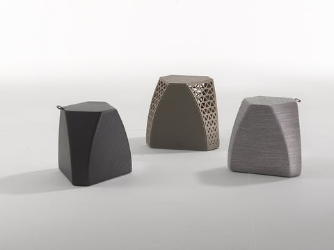 Hudson side piece by Poltrona Frau, featuring gunmetal finish, fine leather upholstery, and Italian craftsmanship, a sophisticated addition to the living room. by Poltrona Frau