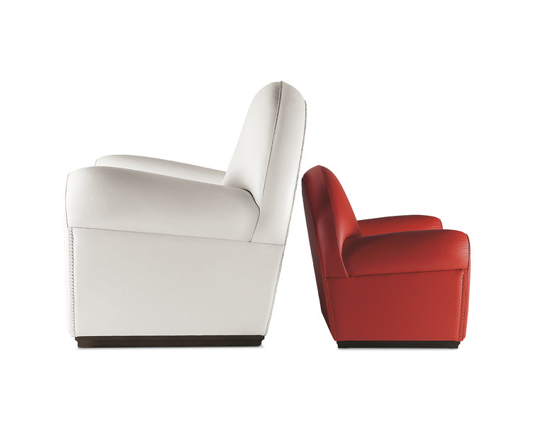 A luxurious Baby Vanity Fair chair by Poltrona Frau, featuring handcrafted fine leather upholstery, solid beech structure, and sophisticated Italian design.
 by Poltrona Frau for sale at Home Resource Modern Furniture Store Sarasota Florida