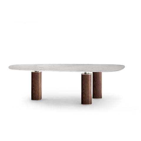 Jane table by Poltrona Frau, featuring a marble top, solid wood structure, and Italian craftsmanship, adding elegance and sophistication to the dining room. by Poltrona Frau