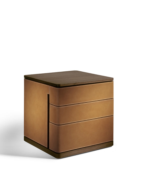 Fidelio Notte chest of drawers, tall boy, or bedside table by Poltrona Frau, featuring Canaletto walnut and birch plywood structure, Cuoio Saddle or Saddle Extra leather upholstery, steel adjustable feet. by Poltrona Frau for sale at Home Resource Modern Furniture Store Sarasota Florida
