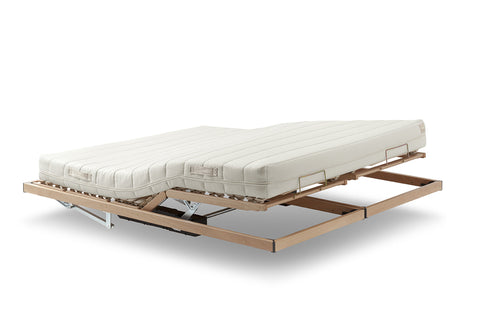 Libeccio electric adjustable bed base by Poltrona Frau in fine leather with modern design, offering luxurious comfort and superior craftsmanship. Available in Sarasota, Florida.
 by Poltrona Frau