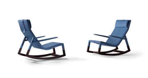 Poltrona Frau Don’do rocking chair featuring fine leather upholstery, sleek modern design, and expert Italian craftsmanship, perfect for outdoor or living spaces.
 by Poltrona Frau