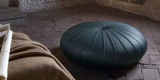 Esedra Ottoman by Poltrona Frau, featuring luxurious Pelle Frau® leather upholstery, Lapp handicrafts-inspired design, and plywood and polyurethane foam padded internal frame. by Poltrona Frau for sale at Home Resource Modern Furniture Store Sarasota Florida