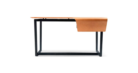 Fred desk by Poltrona Frau, featuring saddle-leather surface with hand-produced incisions and cold markings, ethereal geometries, and luxurious Pelle Frau® leather upholstery. by Poltrona Frau