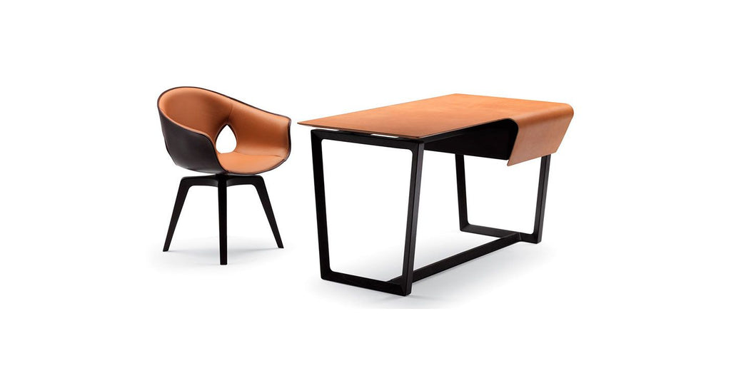 Fred desk by Poltrona Frau, featuring saddle-leather surface with hand-produced incisions and cold markings, ethereal geometries, and luxurious Pelle Frau® leather upholstery. by Poltrona Frau for sale at Home Resource Modern Furniture Store Sarasota Florida