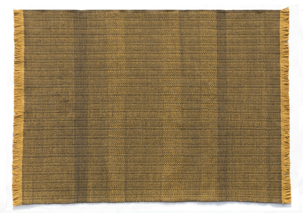 TRES OUTDOOR TEXTURED MUSTARD  by Nanimarquina, available at the Home Resource furniture store Sarasota Florida