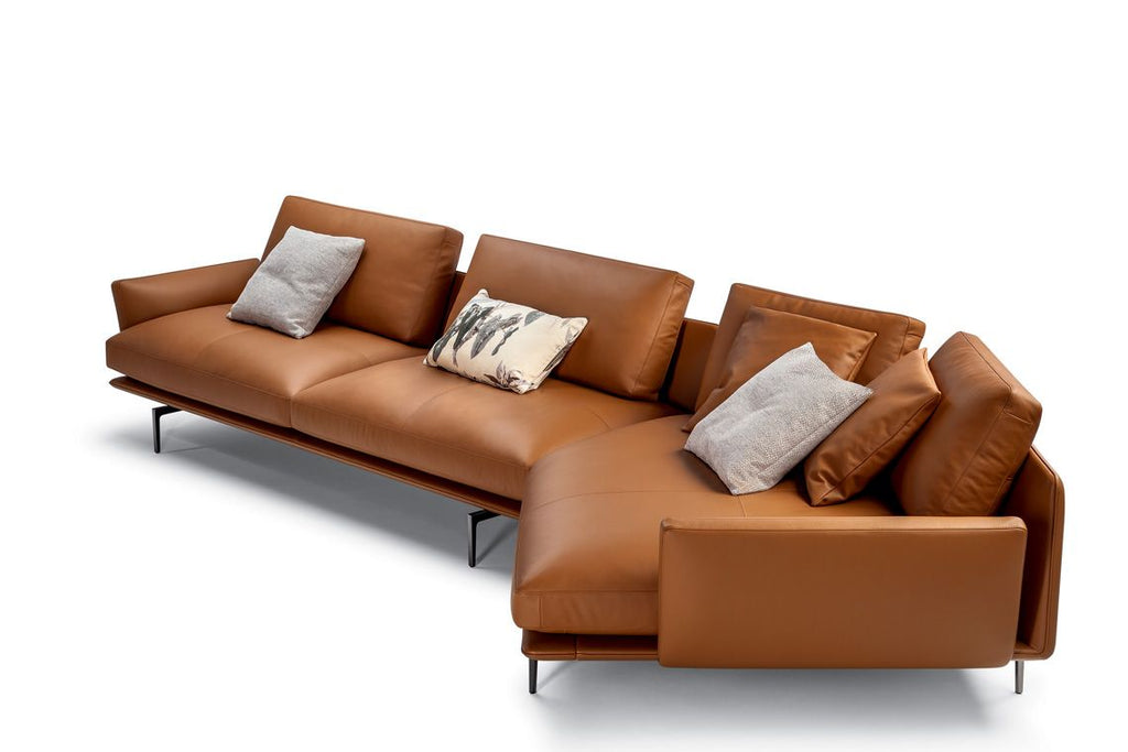 Get Back sofa by Poltrona Frau, featuring Pelle Frau® leather upholstery, sleek lines, comfortable design, and homage to the Beatles. Innovative materials, unique design. by Poltrona Frau for sale at Home Resource Modern Furniture Store Sarasota Florida