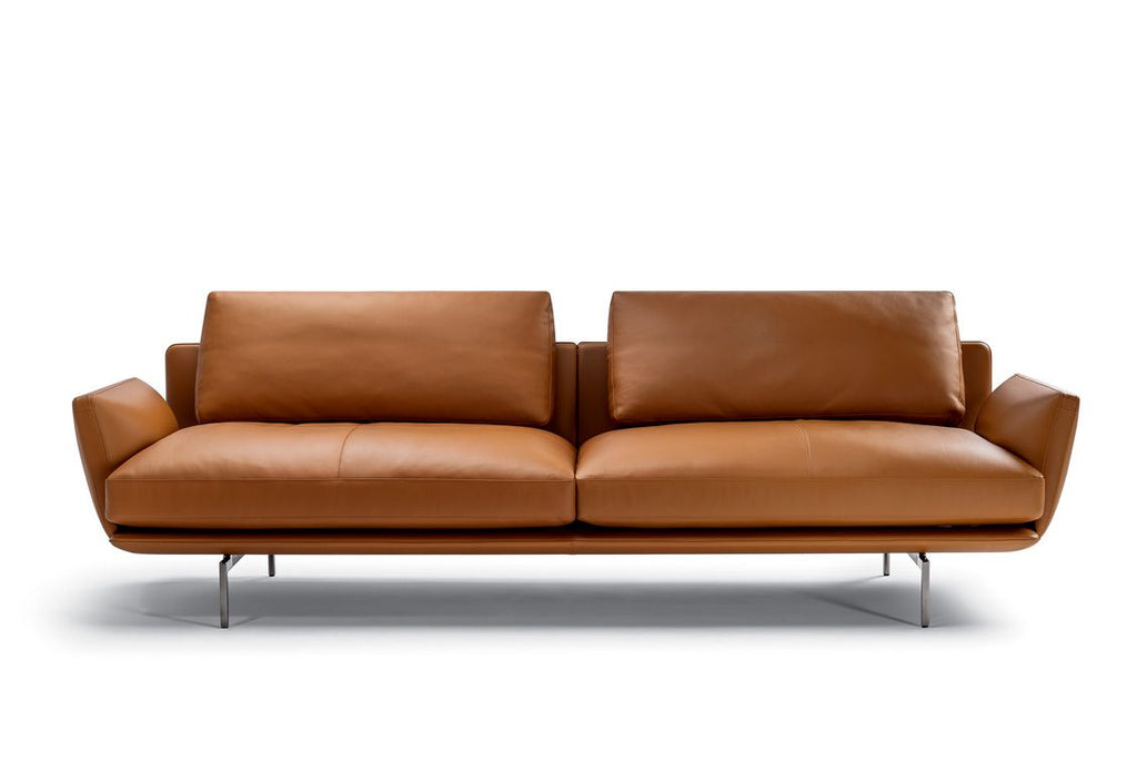 Get Back sofa by Poltrona Frau, featuring Pelle Frau® leather upholstery, sleek lines, comfortable design, and homage to the Beatles. Innovative materials, unique design.  by Poltrona Frau, available at the Home Resource furniture store Sarasota Florida