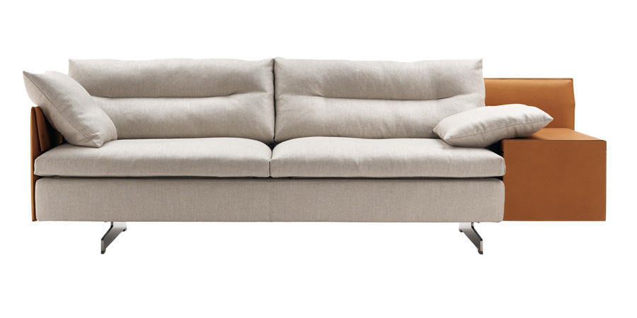 Grantorino Sofa by Poltrona Frau, featuring hand-crafted details, modular design, T-shaped feet, leather and fabric upholstery, hidden trunk-container, and comfortable seats.  by Poltrona Frau, available at the Home Resource furniture store Sarasota Florida