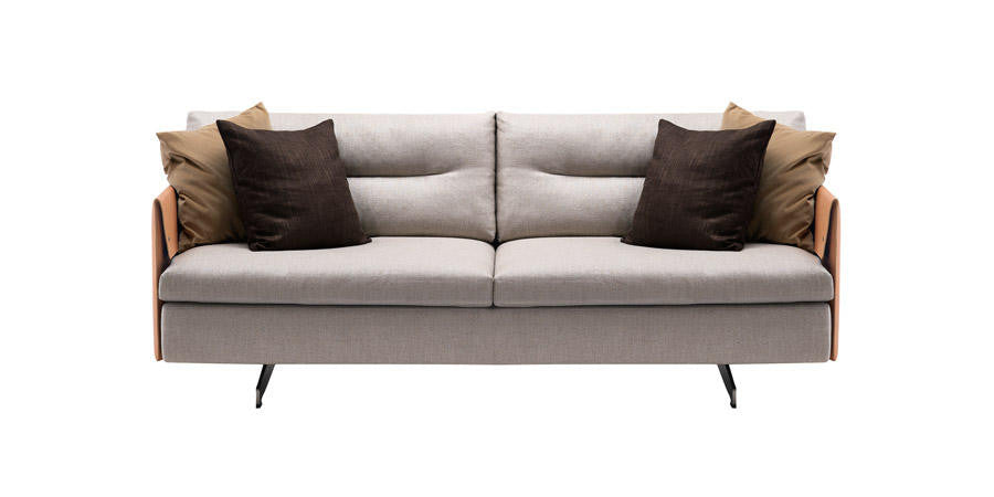Grantorino Sofa by Poltrona Frau, featuring hand-crafted details, modular design, T-shaped feet, leather and fabric upholstery, hidden trunk-container, and comfortable seats. by Poltrona Frau for sale at Home Resource Modern Furniture Store Sarasota Florida