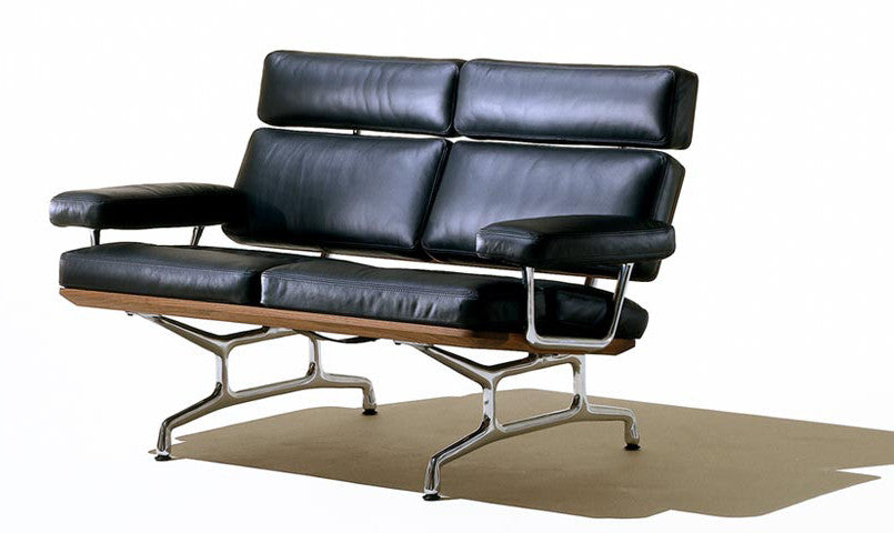 Eames Sofa by Herman Miller, modern and ergonomic, crafted with walnut, leather, and polished aluminum. Available at Home Resource Sarasota. by Herman Miller for sale at Home Resource Modern Furniture Store Sarasota Florida