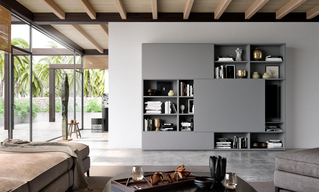 A sleek and customizable studimo shelving system by Interlübke, featuring handcrafted German design, modular shelves, sliding doors, and a stainless steel ladder.
 by INTERLUBKE for sale at Home Resource Modern Furniture Store Sarasota Florida