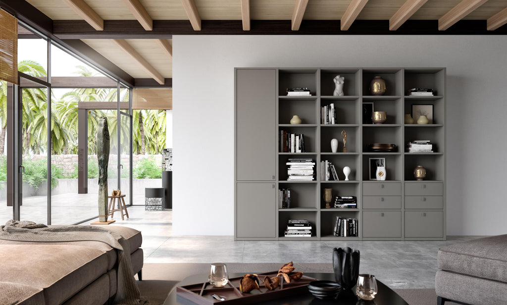 A sleek and customizable studimo shelving system by Interlübke, featuring handcrafted German design, modular shelves, sliding doors, and a stainless steel ladder.
 by INTERLUBKE for sale at Home Resource Modern Furniture Store Sarasota Florida