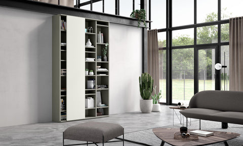 A sleek and customizable studimo shelving system by Interlübke, featuring handcrafted German design, modular shelves, sliding doors, and a stainless steel ladder.
 by INTERLUBKE